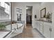 Serene bathroom with soaking tub, double vanity, and walk-in closet at 8248 S Yantley Ct, Aurora, CO 80016