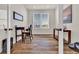 Bright home office with natural light and wooden desk at 8248 S Yantley Ct, Aurora, CO 80016