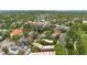 An aerial view displaying the neighborhood's layout and green spaces at 3050 W 32Nd Ave # 202C, Denver, CO 80211