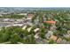 An aerial view showcasing the urban neighborhood with tree-lined streets at 3050 W 32Nd Ave # 202C, Denver, CO 80211