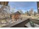 Scenic view from a balcony overlooking a well-manicured yard with mature trees at 3050 W 32Nd Ave # 202C, Denver, CO 80211