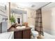 Bathroom with sink, bathtub, and washer/dryer unit at 3050 W 32Nd Ave # 202C, Denver, CO 80211