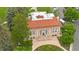 Bird's eye view of a brick building featuring a red tile roof and arched windows at 3050 W 32Nd Ave # 202C, Denver, CO 80211