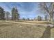 Scenic view of open park area with a paved path and scattered trees in a tranquil setting at 3050 W 32Nd Ave # 202C, Denver, CO 80211