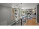 Bright living room with hardwood floors, fireplace, and modern decor at 6100 Apache Dr, Larkspur, CO 80118