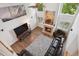 High angle view of living room, vaulted ceiling, fireplace, and many windows at 19653 E Ida Dr, Aurora, CO 80015