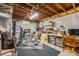 The basement includes an unfinished office area, with a bicycle and storage containers at 1166 Krameria St, Denver, CO 80220