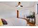 This bedroom features closet space and an ensuite bathroom at 1166 Krameria St, Denver, CO 80220
