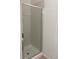 Bathroom shower stall with glass door and tile at 9300 E Florida Ave # 608, Denver, CO 80247