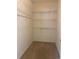 Spacious walk-in closet with wire shelving at 9300 E Florida Ave # 608, Denver, CO 80247