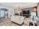 Spacious living room featuring a fireplace and built-in media wall at 7119 S Riviera St, Aurora, CO 80016