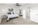 Bedroom with carpeted floors, ceiling fan, and large closet at 2232 Coronado Pkwy # B, Denver, CO 80229
