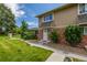 Lovely home with front yard and a welcoming entrance at 2232 Coronado Pkwy # B, Denver, CO 80229