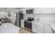 Modern kitchen with stainless steel appliances and plenty of counter space at 2232 Coronado Pkwy # B, Denver, CO 80229