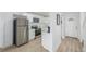 Bright kitchen with stainless steel appliances and white cabinets at 2232 Coronado Pkwy # B, Denver, CO 80229
