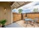 Cozy outdoor patio area with table and chairs, perfect for relaxing at 2232 Coronado Pkwy # B, Denver, CO 80229