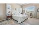 Bright main bedroom features large windows and neutral décor at 5425 E 125Th Pl, Thornton, CO 80241