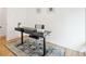 Comfortable office space with a stylish desk, chair, and decorative rug, perfect for remote work or studying at 5445 Nebraska Way, Denver, CO 80246