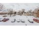 Aerial view of the community, snow covered at 14191 E Jewell Ave # 203, Aurora, CO 80012