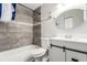 Updated bathroom with new vanity and tile at 14191 E Jewell Ave # 203, Aurora, CO 80012