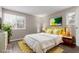 Spacious bedroom with wood-look floors and large windows at 14191 E Jewell Ave # 203, Aurora, CO 80012