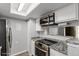 Modern kitchen with stainless steel appliances at 14191 E Jewell Ave # 203, Aurora, CO 80012