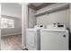 Convenient laundry room with washer and dryer included at 14191 E Jewell Ave # 203, Aurora, CO 80012