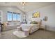 Bright bedroom with a window seat and a comfy rug at 2960 High Prairie Way, Broomfield, CO 80023