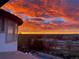 Gorgeous sunrise view from the home featuring an expansive sky, and neighborhood homes at 2960 High Prairie Way, Broomfield, CO 80023