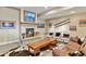 Cozy living room with stone fireplace and wooden mantel at 2960 High Prairie Way, Broomfield, CO 80023