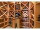 Wood wine cellar with custom racks and temperature control at 2960 High Prairie Way, Broomfield, CO 80023