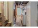 Basement laundry area with washer, dryer, and exposed ductwork and pipes at 458 Cherry St, Hudson, CO 80642