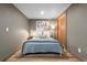 Tranquil bedroom with neutral tones, a queen bed, and closet at 6625 E 6Th Avenue Pkwy, Denver, CO 80220
