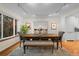Elegant dining area with ample natural light, stylish furniture, and a contemporary design at 6625 E 6Th Avenue Pkwy, Denver, CO 80220
