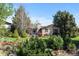 Charming single-story home with a landscaped front yard and a cozy front deck at 6625 E 6Th Avenue Pkwy, Denver, CO 80220