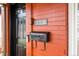 Close up of the red brick front exterior showing the front door, mail box, and address at 3632 N Marion St, Denver, CO 80205