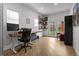 Bright office space with desk, shelving, and a view to the back yard at 3632 N Marion St, Denver, CO 80205