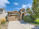 Charming front exterior of a well-maintained two-story home with a spacious driveway and attractive landscaping at 16658 Prospect Ln, Broomfield, CO 80023
