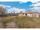 Large backyard with a storage shed at 2916 S Jasper St, Aurora, CO 80013