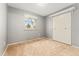 Neutral bedroom with wall closet and window view at 2916 S Jasper St, Aurora, CO 80013