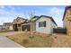 Charming home with a stone-accented garage, light siding, and low-maintenance landscaping at 4391 Mcmurdo Ct, Castle Rock, CO 80108