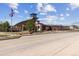 Inviting community clubhouse with contemporary architecture and landscaping at 12663 Buffington Trl, Parker, CO 80134