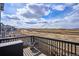 Overlooking a scenic landscape, the deck includes a convenient storage bench at 12663 Buffington Trl, Parker, CO 80134