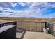 View from a spacious deck with a storage bench and scenic land views at 12663 Buffington Trl, Parker, CO 80134