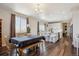 Dining area with large windows and a view, seamlessly connecting to the kitchen at 12663 Buffington Trl, Parker, CO 80134