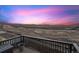 Relaxing deck view with a lovely sunset and beautiful open scenery at 12663 Buffington Trl, Parker, CO 80134