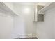 Walk-in closet with shelving and wooden floors at 10150 E Virginia Ave # 7-204, Denver, CO 80247