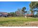 Community park featuring a grassy area, volleyball net, and picnic shelters at 10150 E Virginia Ave # 7-204, Denver, CO 80247
