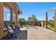 Outdoor deck with seating, offering scenic views at 713 Aspen Rd, Golden, CO 80401