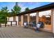 Inviting outdoor deck featuring comfortable seating and a tranquil setting at 713 Aspen Rd, Golden, CO 80401